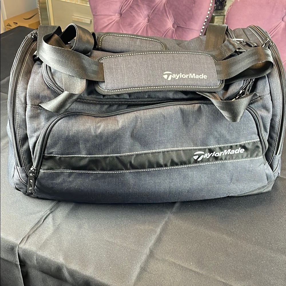 TaylorMade Black Duffel Bag with Sleek Design and Durable Material 20 inches
